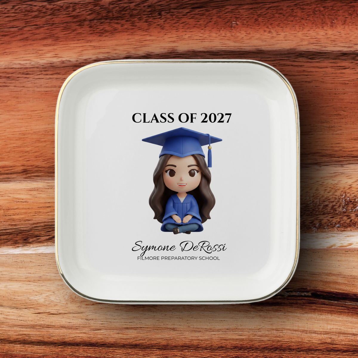 Custom graduation jewelry dish featuring graduate photo transformed into chibi art with royal blue cap and gown